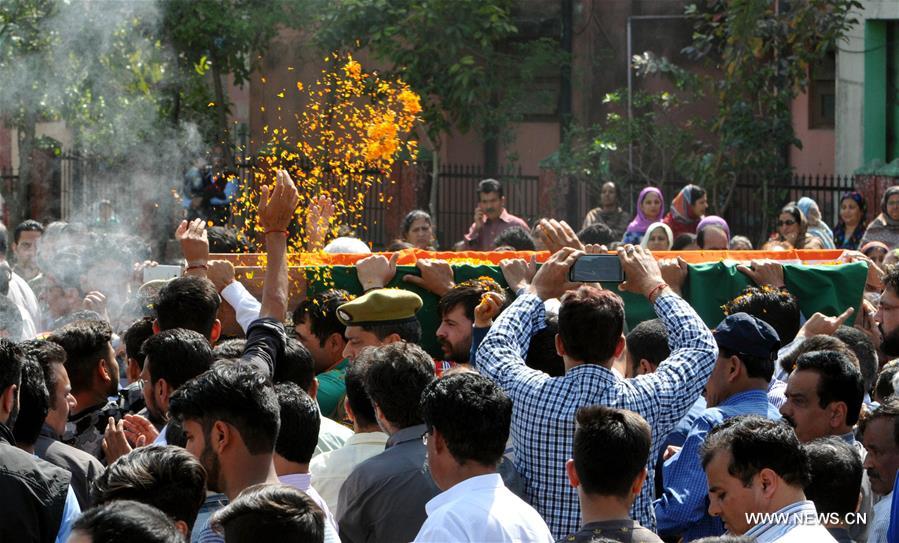 INDIAN-CONTROLLED KASHMIR-JAMMU-POLICE GUARD-FUNERAL