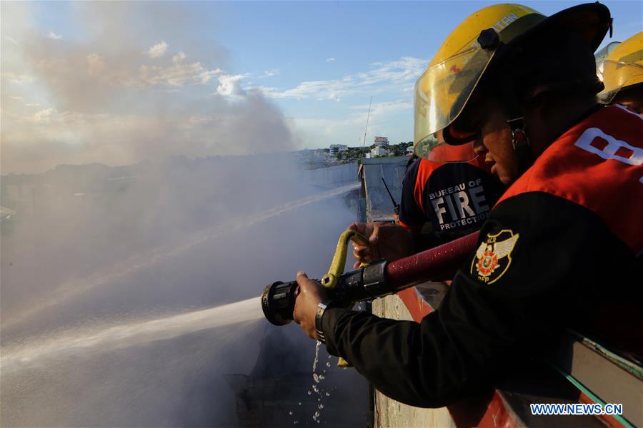 PHILIPPINES-QUEZON-SLUM AREA-FIRE