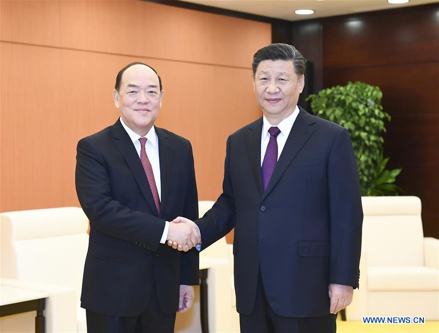 CHINA-MACAO-XI JINPING-HO IAT SENG-MEETING 