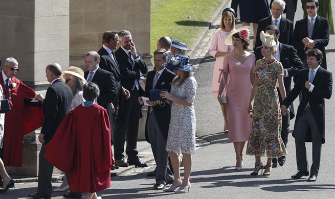 Guests arrive at Windsor Castle for royal wedding in Britain