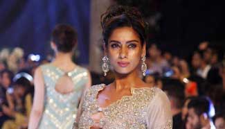 Models present creations during Pakistan bridal fashion week