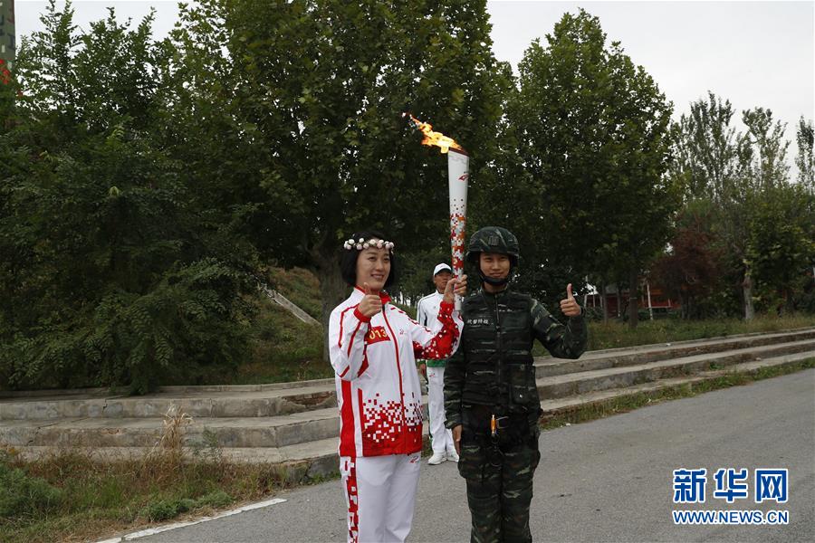 （军运会·图文互动）（2）军运会军营火炬传递活动最后一站武警猎鹰突击队站举行（配本社同题文字稿）